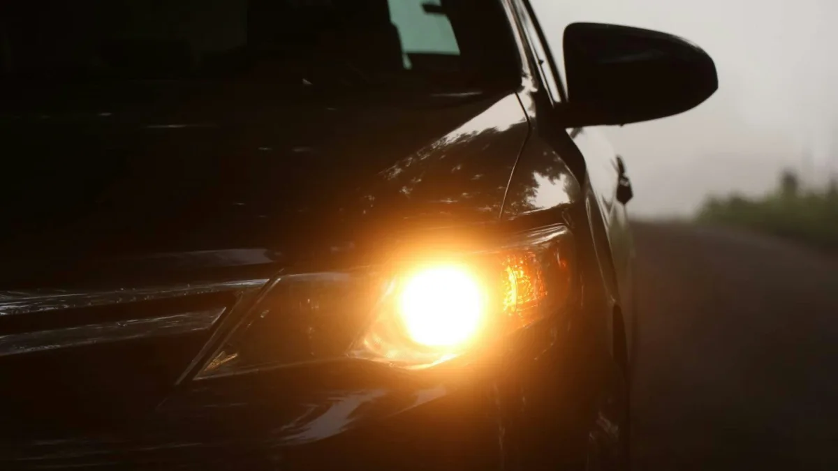 Amber driver-assist warning glowing on an instrument cluster after a reset attempt