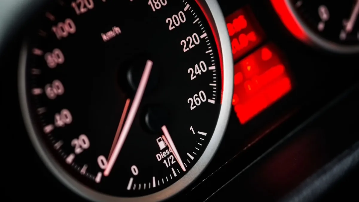 Instrument cluster showing several amber driver-assist warning symbols lit at once
