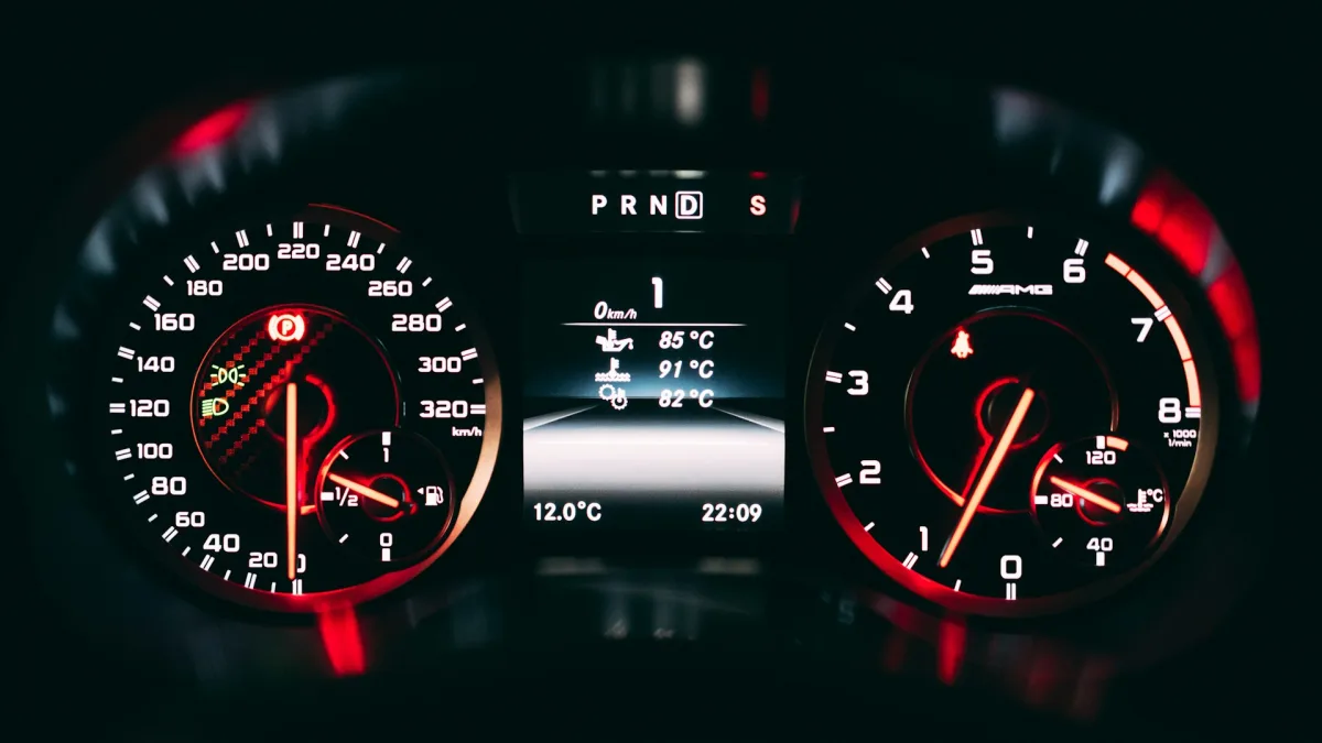 Amber lane departure symbol lit on a vehicle instrument cluster