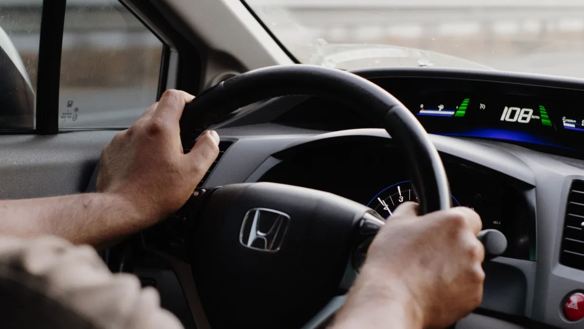 Honda center screen displaying the passenger side LaneWatch camera feed while merging