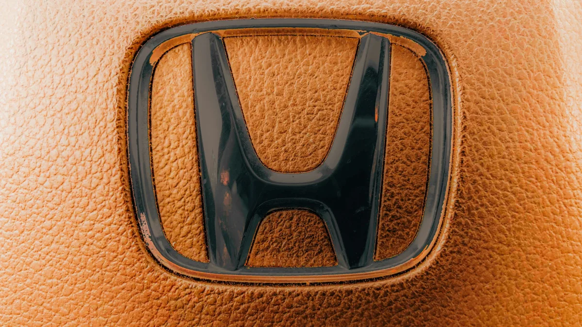Green lane keeping indicator lit in a Honda gauge cluster