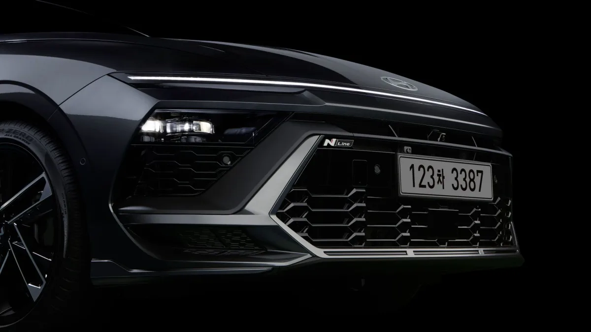Front radar sensor mounted low in a Hyundai grille below the emblem