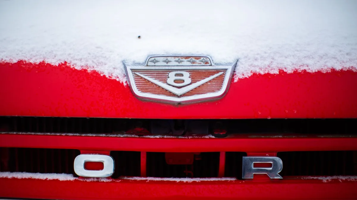 Snow and ice packed across a front grille over the radar area