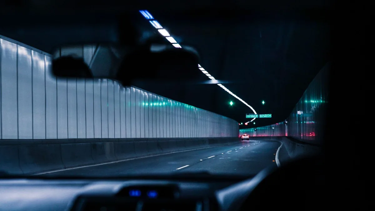 A vehicle on a marked highway during a drive-based sensor calibration