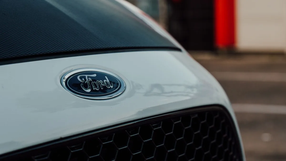 Front grille area where the AEB radar sensor sits behind the vehicle emblem