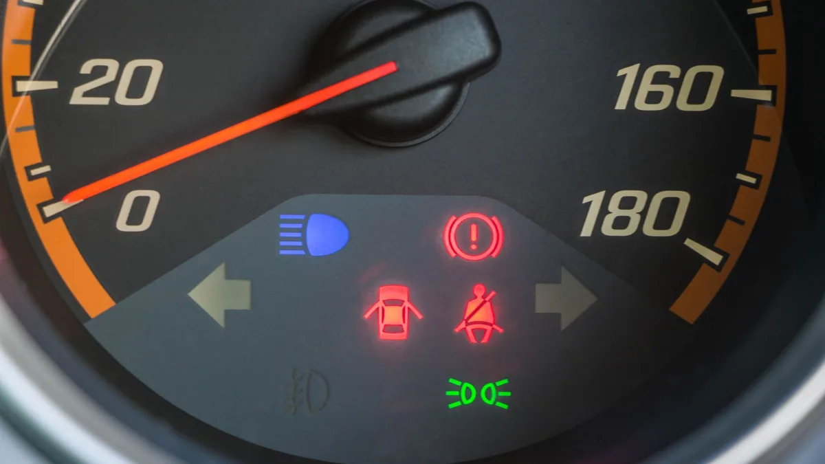 Amber pre-collision warning message on a Toyota instrument display